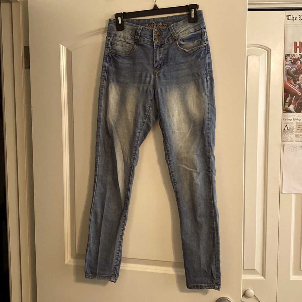 A little bit worn but still in good shape! Fit like a 4!